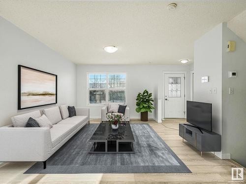 7706 15 Avenue, Edmonton, AB - Indoor Photo Showing Living Room