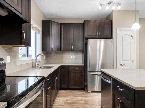 903 Morris Way, Leduc, AB - Indoor Photo Showing Kitchen With Double Sink