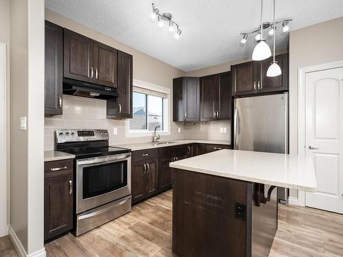 903 Morris Way, Leduc, AB - Indoor Photo Showing Kitchen With Upgraded Kitchen