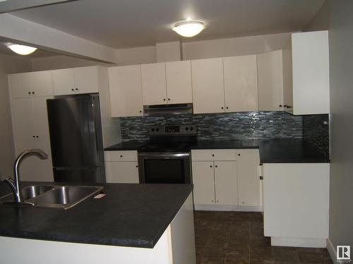 4901 47 Avenue, Myrnam, AB - Indoor Photo Showing Kitchen With Double Sink