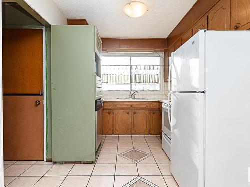 12024 53 Street, Edmonton, AB - Indoor Photo Showing Kitchen With Double Sink