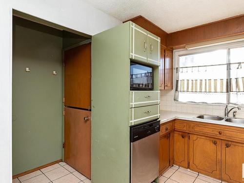 12024 53 Street, Edmonton, AB - Indoor Photo Showing Kitchen With Double Sink