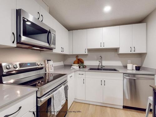 648 174 Avenue, Edmonton, AB - Indoor Photo Showing Kitchen With Double Sink