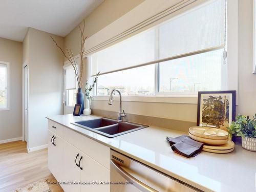 648 174 Avenue, Edmonton, AB - Indoor Photo Showing Kitchen With Double Sink