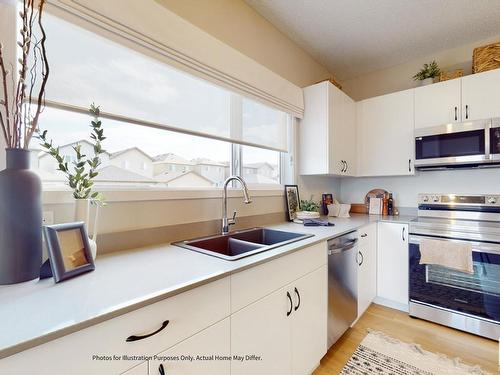 648 174 Avenue, Edmonton, AB - Indoor Photo Showing Kitchen With Double Sink