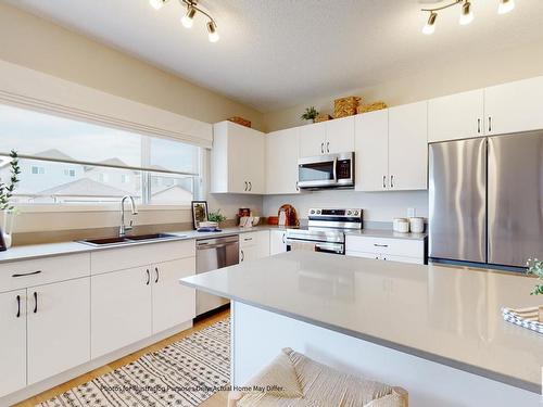 648 174 Avenue, Edmonton, AB - Indoor Photo Showing Kitchen With Double Sink