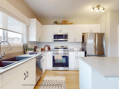 648 174 Avenue, Edmonton, AB - Indoor Photo Showing Kitchen With Double Sink