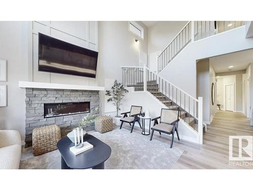 20 Meadowbrook Way, Spruce Grove, AB - Indoor Photo Showing Living Room With Fireplace