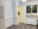 11809/11811 40 Street, Edmonton, AB  - Indoor Photo Showing Kitchen With Double Sink 