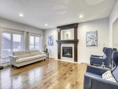 3131 Winspear Crescent Sw, Edmonton, AB - Indoor Photo Showing Living Room With Fireplace