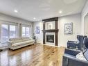 3131 Winspear Crescent Sw, Edmonton, AB  - Indoor Photo Showing Living Room With Fireplace 