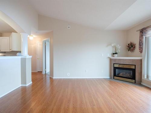 507 237 Youville Drive E, Edmonton, AB - Indoor Photo Showing Living Room With Fireplace