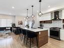 8032 174A Avenue, Edmonton, AB  - Indoor Photo Showing Kitchen With Upgraded Kitchen 