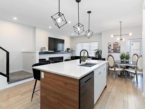 8032 174A Avenue, Edmonton, AB - Indoor Photo Showing Kitchen With Double Sink With Upgraded Kitchen