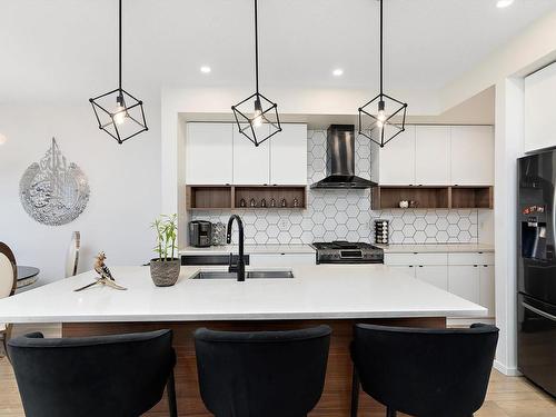 8032 174A Avenue, Edmonton, AB - Indoor Photo Showing Kitchen With Double Sink With Upgraded Kitchen