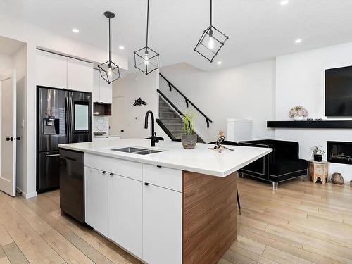 8032 174A Avenue, Edmonton, AB - Indoor Photo Showing Kitchen With Double Sink