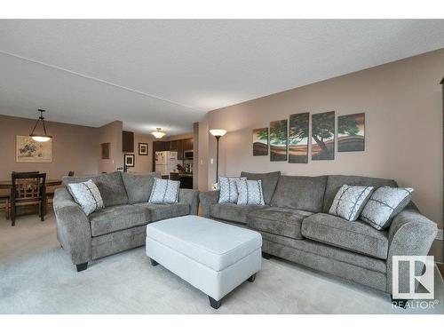 215 17459 98A Avenue, Edmonton, AB - Indoor Photo Showing Living Room