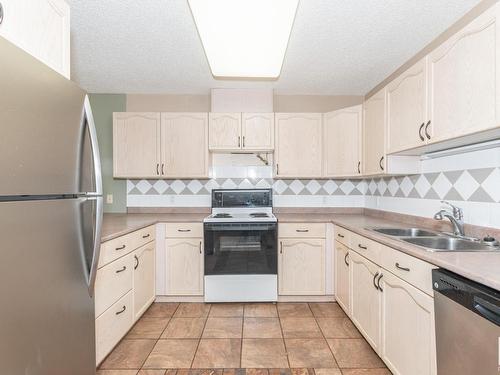 1 160 Kingswood Boulevard, St. Albert, AB - Indoor Photo Showing Kitchen With Double Sink