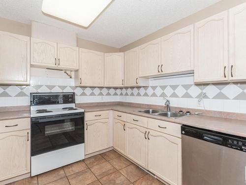 1 160 Kingswood Boulevard, St. Albert, AB - Indoor Photo Showing Kitchen With Double Sink