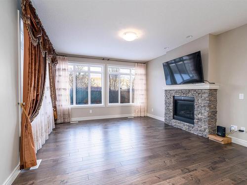 16320 17 Avenue Sw, Edmonton, AB - Indoor Photo Showing Living Room With Fireplace