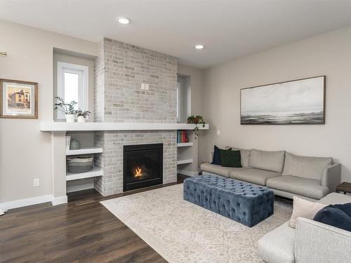 130 Ambleside Way, Sherwood Park, AB - Indoor Photo Showing Living Room With Fireplace