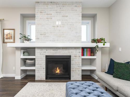 130 Ambleside Way, Sherwood Park, AB - Indoor Photo Showing Living Room With Fireplace