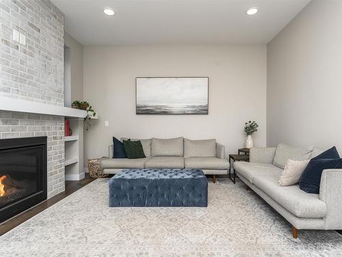 130 Ambleside Way, Sherwood Park, AB - Indoor Photo Showing Living Room With Fireplace