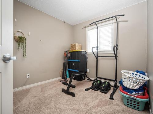 80 Meadowland Crescent, Spruce Grove, AB - Indoor Photo Showing Gym Room