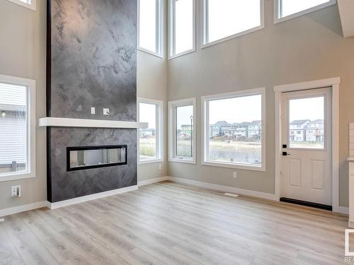 668 Kinglet Boulevard, Edmonton, AB - Indoor Photo Showing Living Room With Fireplace