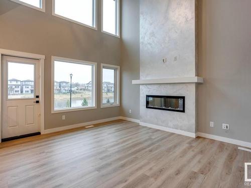 684 Kinglet Boulevard, Edmonton, AB - Indoor Photo Showing Living Room With Fireplace