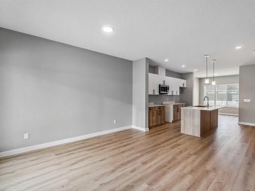 181 Sunland Way, Sherwood Park, AB - Indoor Photo Showing Kitchen With Double Sink