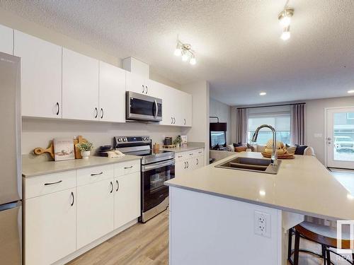 181 Sunland Way, Sherwood Park, AB - Indoor Photo Showing Kitchen With Double Sink