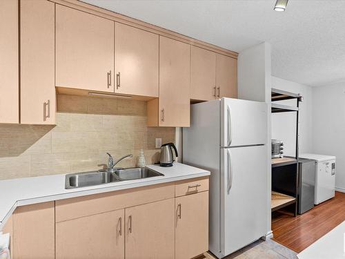 4311 38 Street, Edmonton, AB - Indoor Photo Showing Kitchen With Double Sink