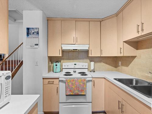 4311 38 Street, Edmonton, AB - Indoor Photo Showing Kitchen With Double Sink