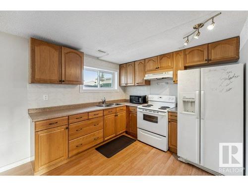 11412 162 Avenue, Edmonton, AB - Indoor Photo Showing Kitchen With Double Sink