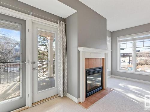 201 9803 96A Street, Edmonton, AB - Indoor With Fireplace