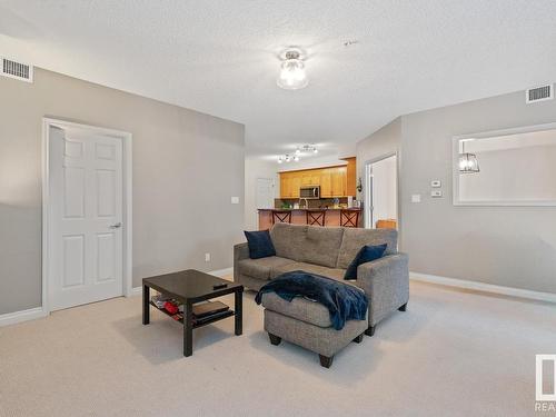 201 9803 96A Street, Edmonton, AB - Indoor Photo Showing Living Room