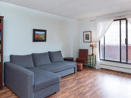 304 9917 110 Street, Edmonton, AB - Indoor Photo Showing Living Room