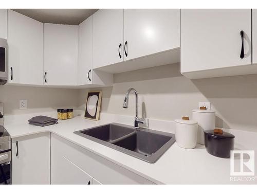 17736 63 Street, Edmonton, AB - Indoor Photo Showing Kitchen With Double Sink