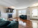 6822 21A Avenue, Edmonton, AB  - Indoor Photo Showing Living Room With Fireplace 