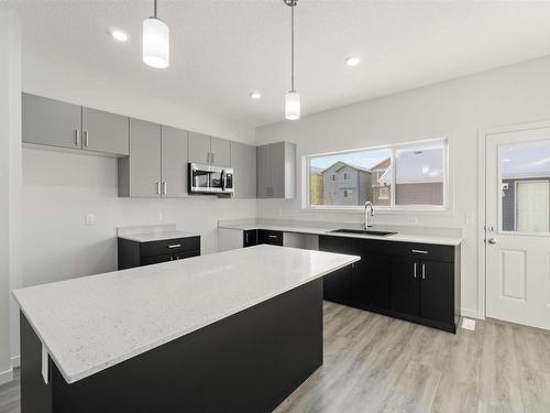 1111 Aster Boulevard, Edmonton, AB - Indoor Photo Showing Kitchen