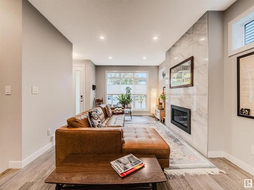 10530 80 Street, Edmonton, AB - Indoor Photo Showing Living Room With Fireplace