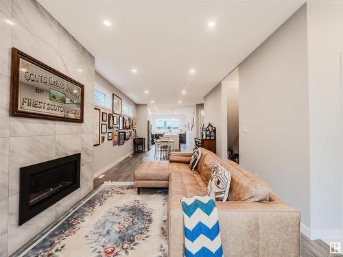 10530 80 Street, Edmonton, AB - Indoor Photo Showing Living Room With Fireplace