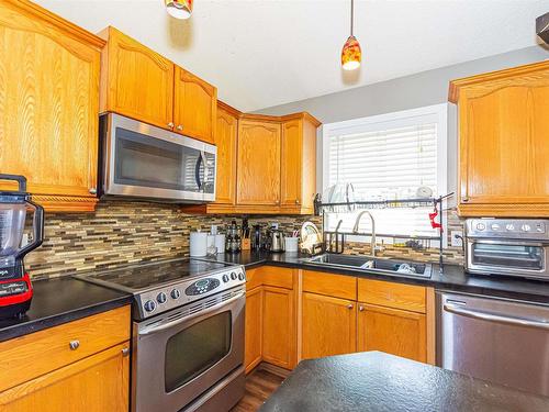 9133 166 Avenue, Edmonton, AB - Indoor Photo Showing Kitchen With Double Sink