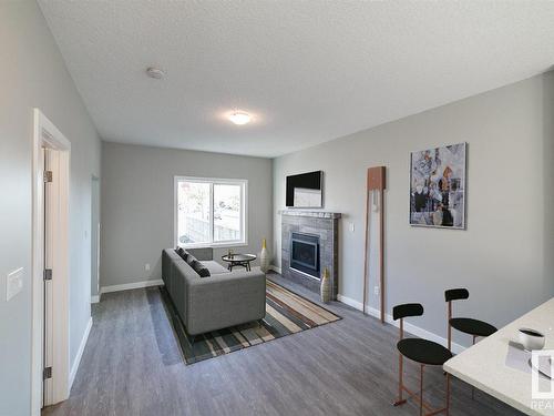 9859 73 Avenue, Edmonton, AB - Indoor Photo Showing Living Room With Fireplace