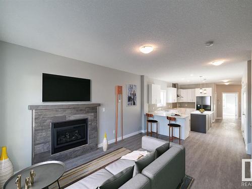 9859 73 Avenue, Edmonton, AB - Indoor Photo Showing Living Room With Fireplace