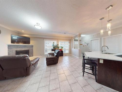 118 7293 South Terwillegar Drive Nw, Edmonton, AB - Indoor With Fireplace