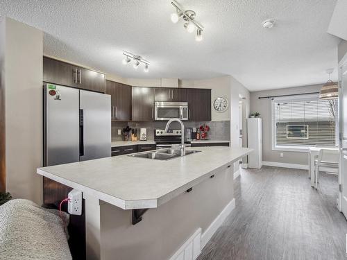 184 Southfork Drive, Leduc, AB - Indoor Photo Showing Kitchen With Double Sink