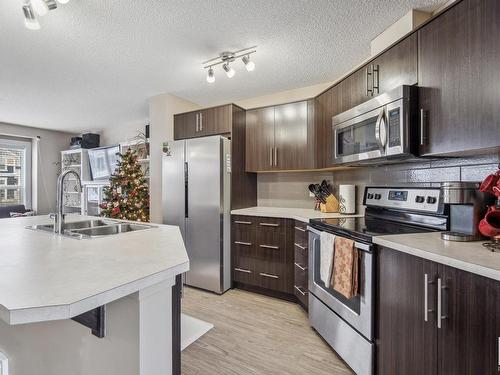 184 Southfork Drive, Leduc, AB - Indoor Photo Showing Kitchen With Double Sink With Upgraded Kitchen