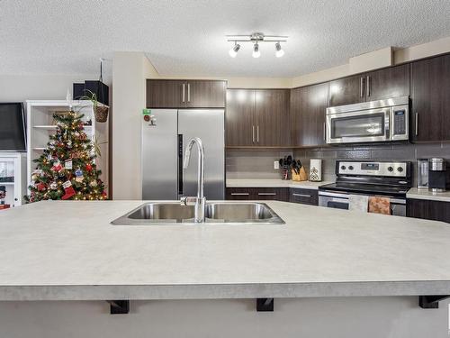 184 Southfork Drive, Leduc, AB - Indoor Photo Showing Kitchen With Double Sink With Upgraded Kitchen